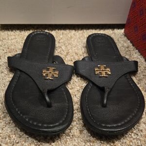 Tory Burch Black Thong Sandals with Gold Emblem